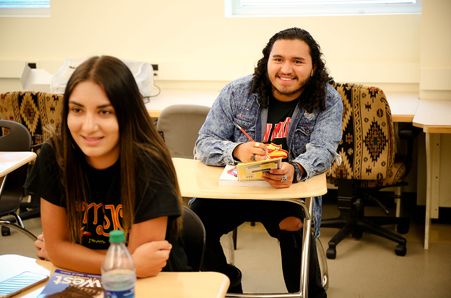 two students in a classroom